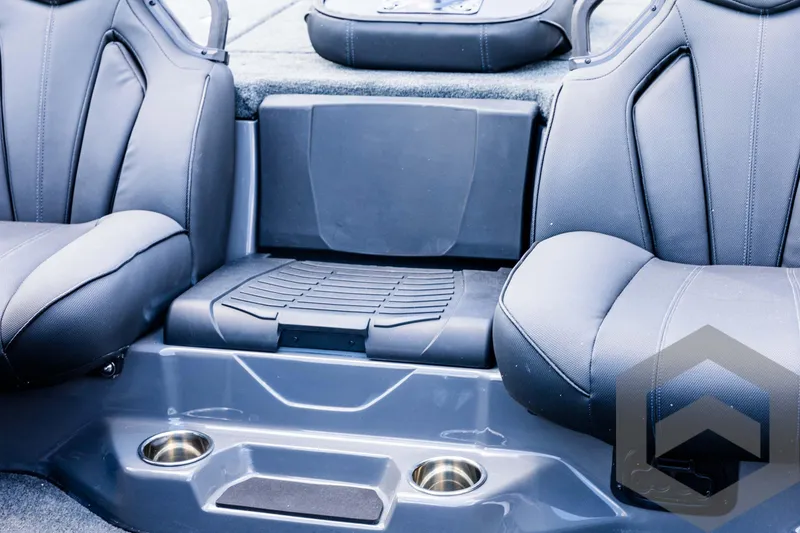Slide: The Image of 2025 Skeeter ZXR 20 boat interior with sleek seating and cup holders. - 44