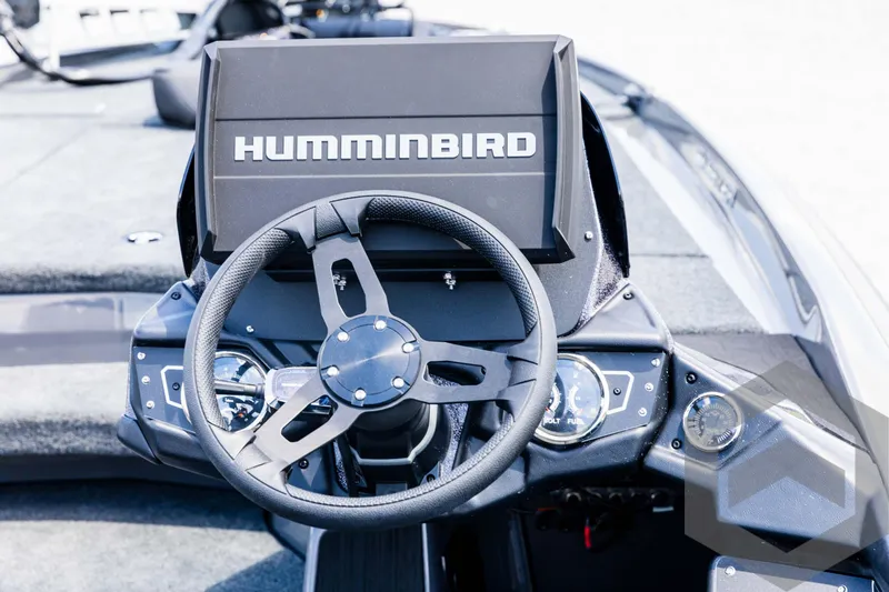 Slide: The Image of 2025 Skeeter ZXR 20 boat dashboard with Humminbird navigation system. - 49
