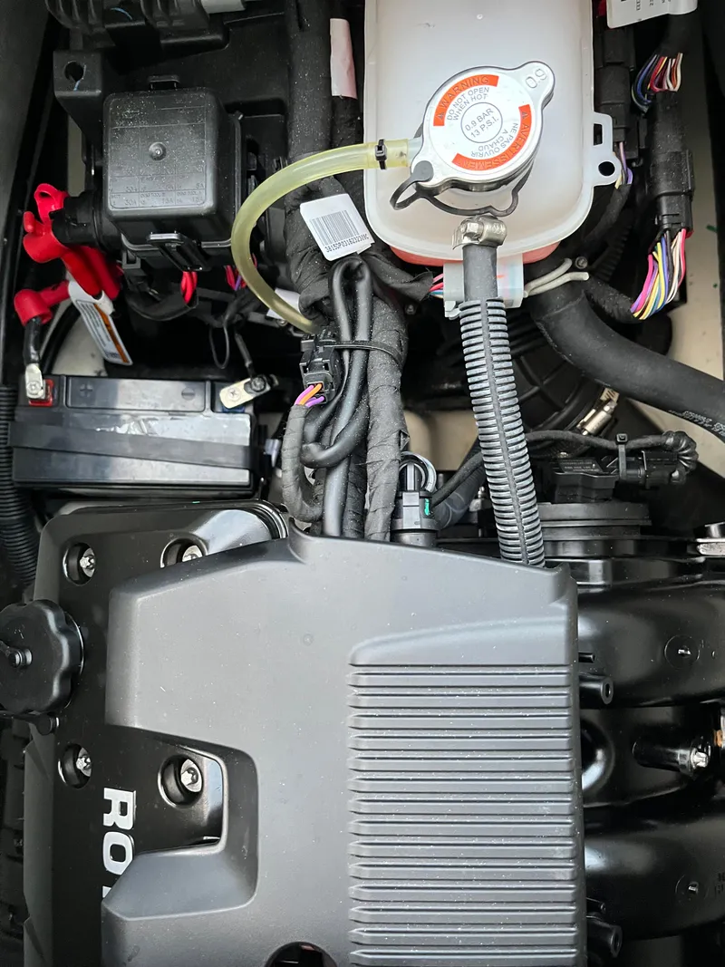 Slide: The Image of Engine compartment of 2023 Sea-Doo GTX 300 Limited, showcasing intricate components and wiring. - 15