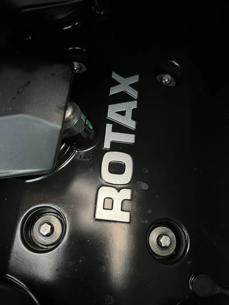 Slide: The Image of Close-up of 2023 Sea-Doo GTX 300 Limited engine with Rotax branding. - 16