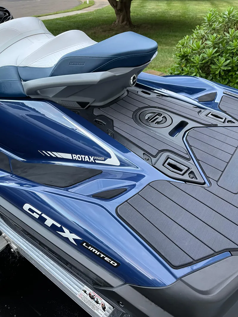 Slide: The Image of 2023 Sea-Doo GTX 300 Limited, blue and white, featuring Rotax power engine. - 3