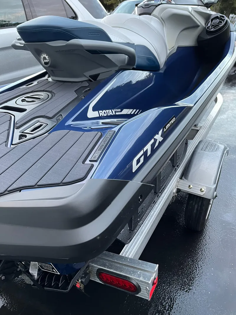 Slide: The Image of 2023 Sea-Doo GTX 300 Limited on trailer, showcasing sleek design and Rotax engine. - 5