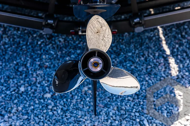Slide: The Image of Skeeter ZXR 21 boat propeller, 2025 model, on gravel surface. - 16