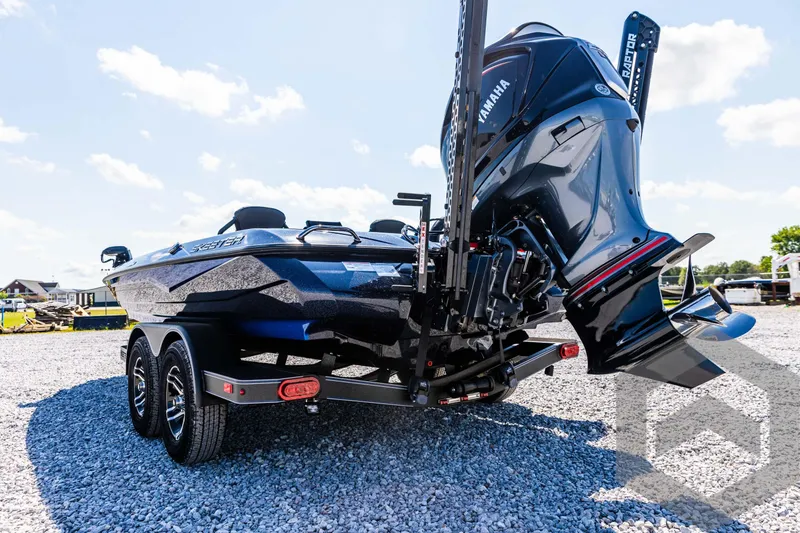 Slide: The Image of 2025 Skeeter ZXR 21 boat with Yamaha engine on gravel lot. - 19
