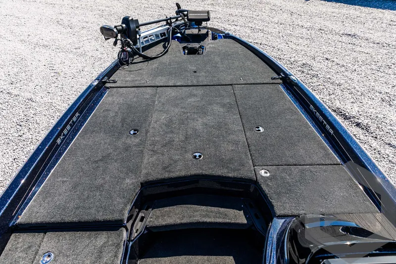 Slide: The Image of 2025 Skeeter ZXR 21 boat deck with advanced fishing equipment. - 26