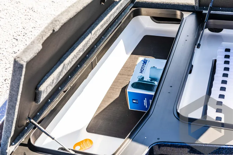 Slide: The Image of Open storage compartment in 2025 Skeeter ZXR 21 boat. - 28