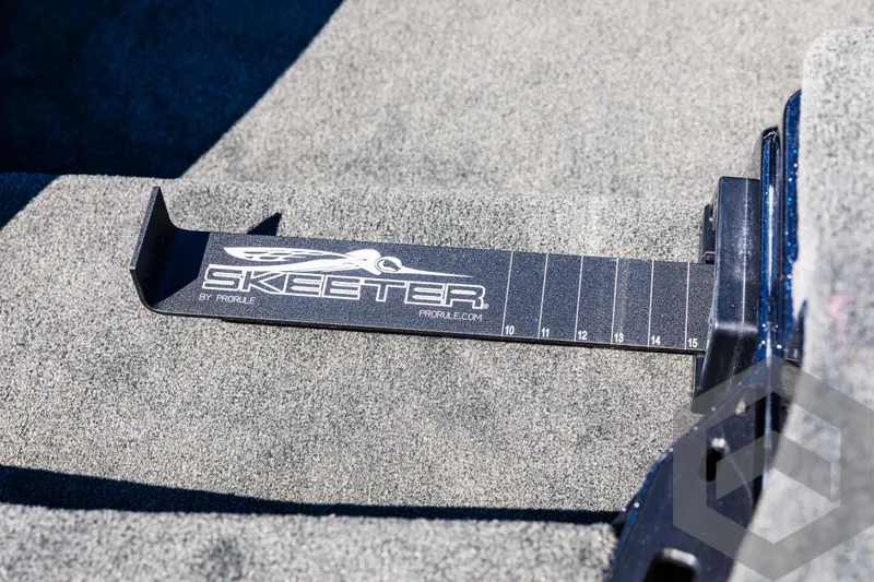 Slide: The Image of Skeeter ZXR 21 boat deck with measuring tool, 2025 model. - 38