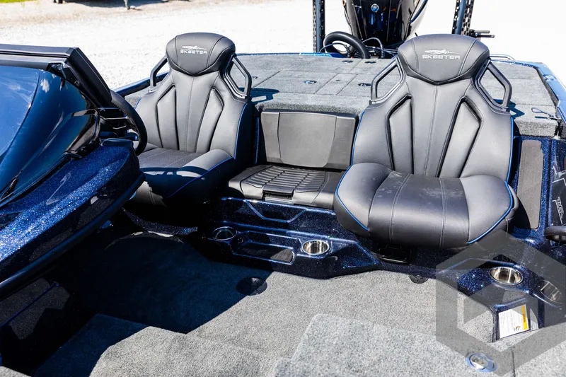 Slide: The Image of 2025 Skeeter ZXR 21 boat interior with sleek black seats and modern design. - 39
