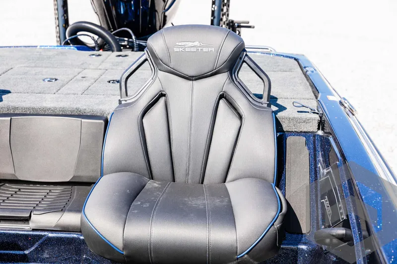 Slide: The Image of Skeeter ZXR 21 boat seat, 2025 model, featuring sleek black design with blue accents. - 40