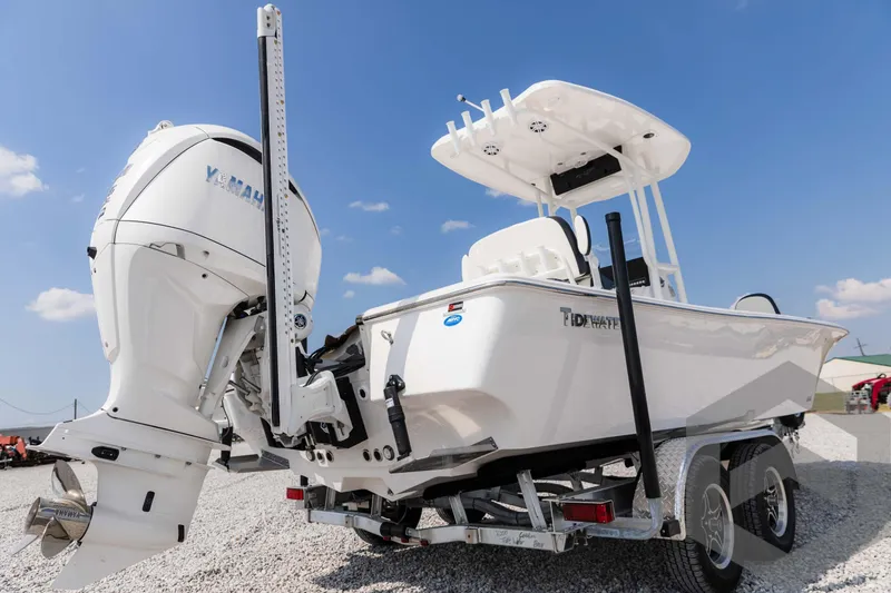 Slide: The Image of 2025 Tidewater 2300 Carolina Bay boat on trailer, featuring Yamaha outboard motor. - 13