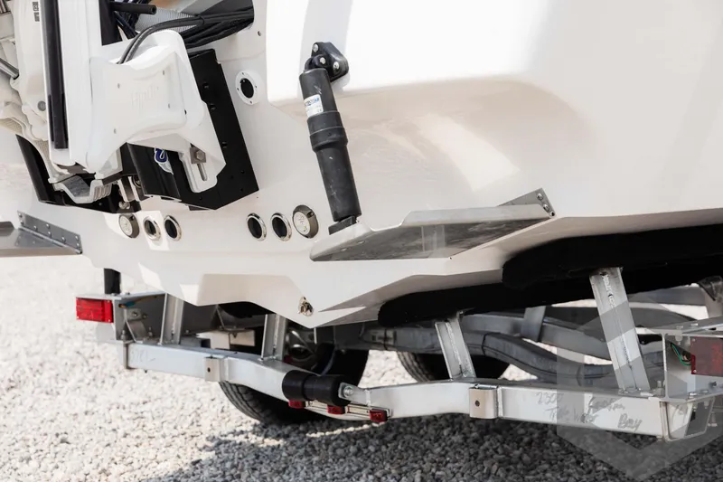 Slide: The Image of 2025 Tidewater 2300 Carolina Bay boat on trailer, rear view. - 14