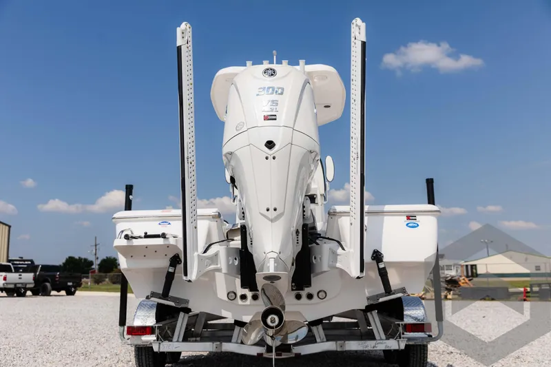 Slide: The Image of 2025 Tidewater 2300 Carolina Bay boat rear view with powerful outboard motor. - 17