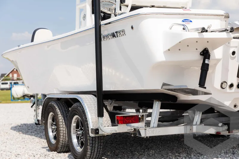 Slide: The Image of 2025 Tidewater 2300 Carolina Bay boat on trailer, rear view. - 20