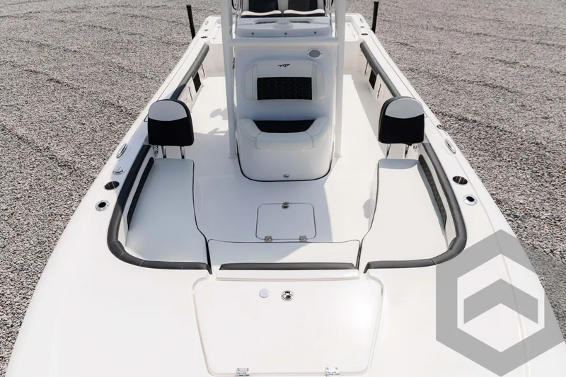 Slide: The Image of 2025 Tidewater 2300 Carolina Bay boat interior, featuring sleek white design and spacious layout. - 23