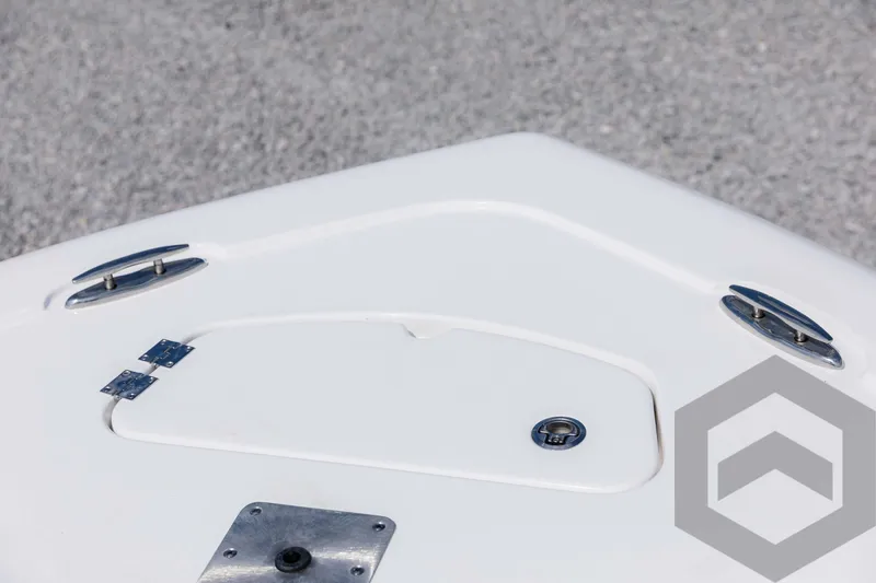 Slide: The Image of 2025 Tidewater 2300 Carolina Bay boat deck with cleats and hatch. - 26