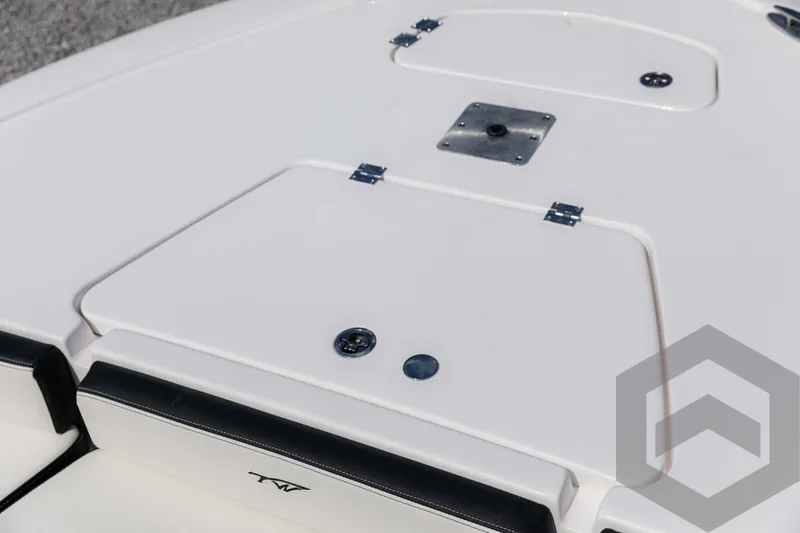 Slide: The Image of 2025 Tidewater 2300 Carolina Bay boat deck with storage compartments. - 28
