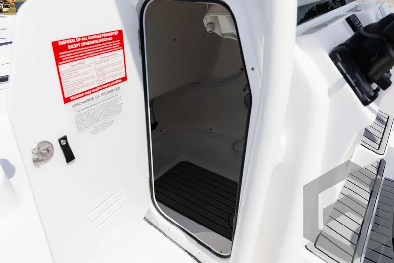 Slide: The Image of 2025 Tidewater 2300 Carolina Bay boat interior storage compartment. - 31