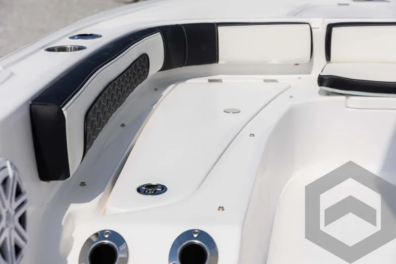 Slide: The Image of 2025 Tidewater 2300 Carolina Bay boat interior with sleek seating and modern design. - 44