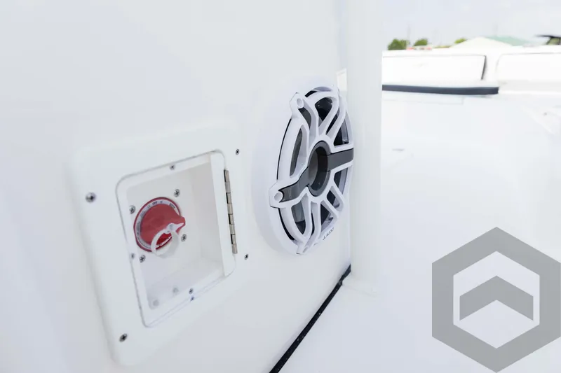 Slide: The Image of Tidewater 2300 Carolina Bay 2025 boat speaker and control panel detail. - 46