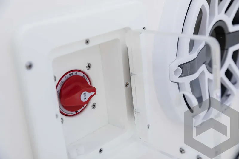 Slide: The Image of Close-up of 2025 Tidewater 2300 Carolina Bay boat control panel and speaker. - 47