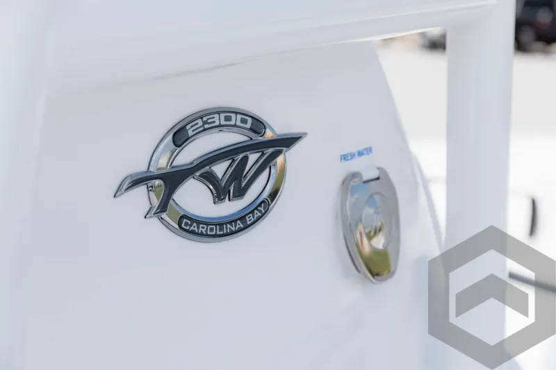 Slide: The Image of 2025 Tidewater 2300 Carolina Bay boat emblem and logo detail. - 48
