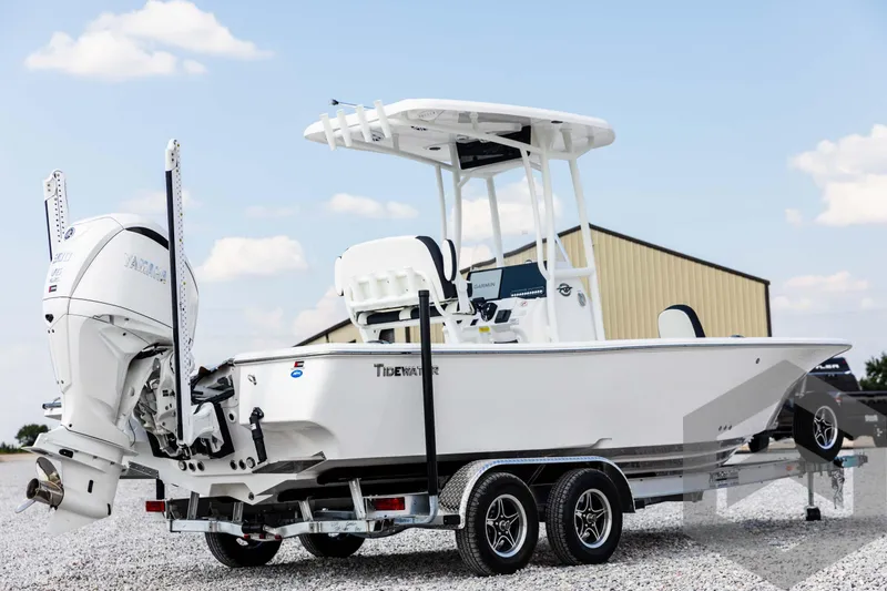 Slide: The Image of 2025 Tidewater 2300 Carolina Bay boat on trailer, featuring sleek design and powerful engine. - 5