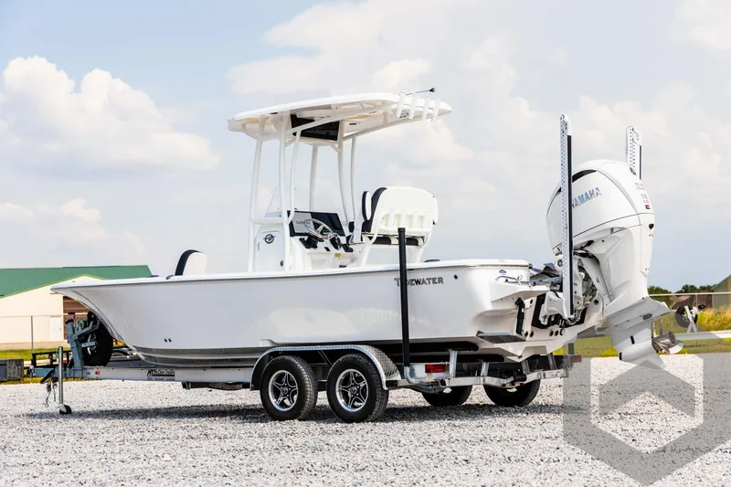 Slide: The Image of 2025 Tidewater 2300 Carolina Bay boat on trailer, side view. - 7