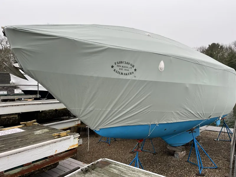 Slide: The Image of 1978 Tartan 37 sailboat covered and stored on stands in a boatyard. - 8