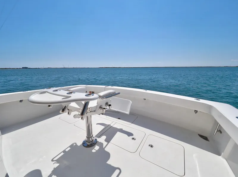 Slide: The Image of 2007 Viking Convertible boat deck overlooking calm blue ocean. - 18