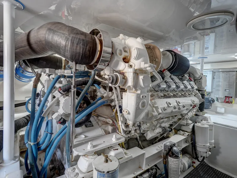 Slide: The Image of Engine room of 2007 Viking Convertible w/ Mezzanine, showcasing detailed machinery and components. - 37