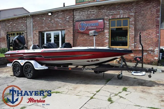 Slide: The Image of 2025 Bass Cat Puma STS boat on trailer at Thayer's Marine dealership. - 1