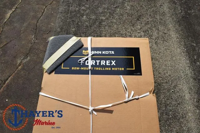 Slide: The Image of Box of Minn Kota Fortrex trolling motor on pavement, Thayer's Marine logo visible. - 10