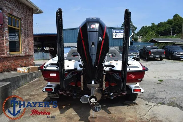 Slide: The Image of 2025 Bass Cat Puma STS boat at Thayer's Marine dealership. - 13