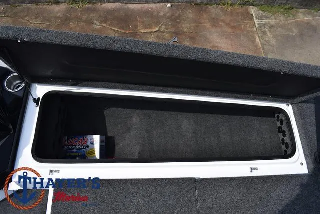 Slide: The Image of 2025 Bass Cat Puma STS storage compartment with Lucas Slick Mist product inside. - 17