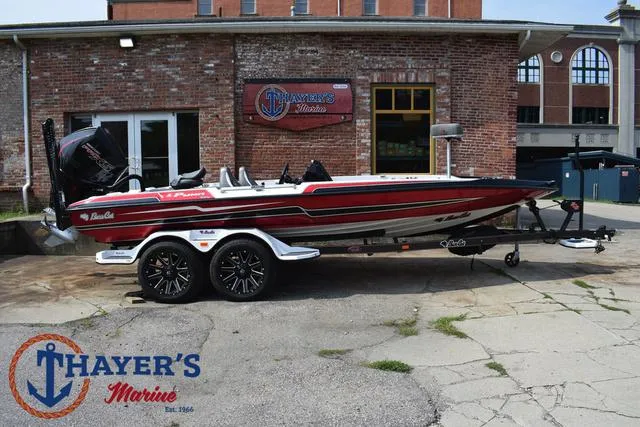 Slide: The Image of 2025 Bass Cat Puma STS boat at Thayer's Marine dealership. - 2