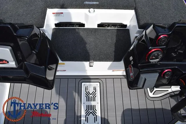 Slide: The Image of 2025 Bass Cat Puma STS boat interior with Thayer's Marine logo. - 22