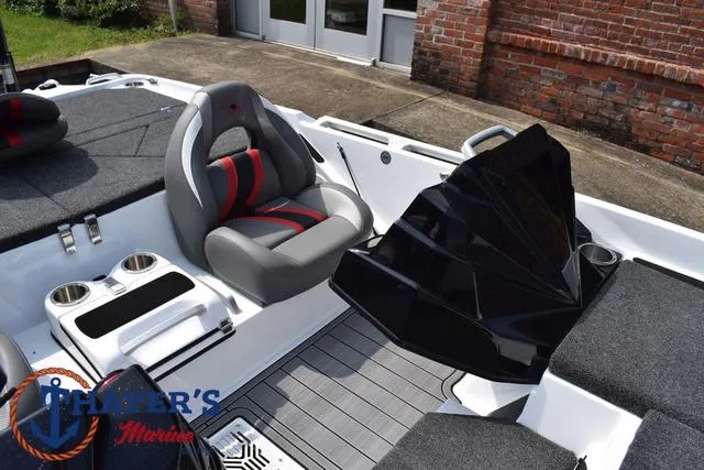 Slide: The Image of 2025 Bass Cat Puma STS boat interior with seating and console, displayed at Hunter's Marine. - 26