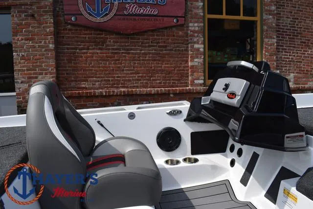 Slide: The Image of 2025 Bass Cat Puma STS boat interior with seating and control panel. - 27