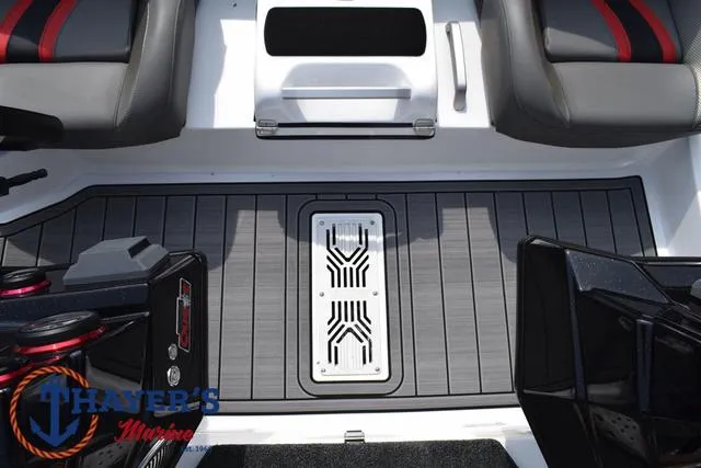 Slide: The Image of 2025 Bass Cat Puma STS boat interior with sleek seating and modern flooring design. - 33