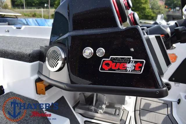 Slide: The Image of 2025 Bass Cat Puma STS boat dashboard with Quest logo and Thayer's Marine branding. - 40