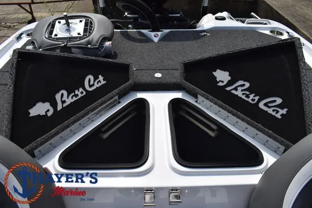 Slide: The Image of 2025 Bass Cat Puma STS boat deck with storage compartments and Mayer's Marine logo. - 48