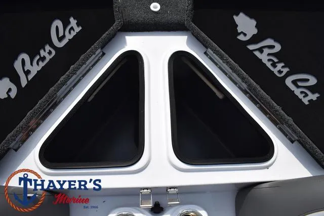 Slide: The Image of 2025 Bass Cat Puma STS boat interior with Thayer's Marine logo. - 49