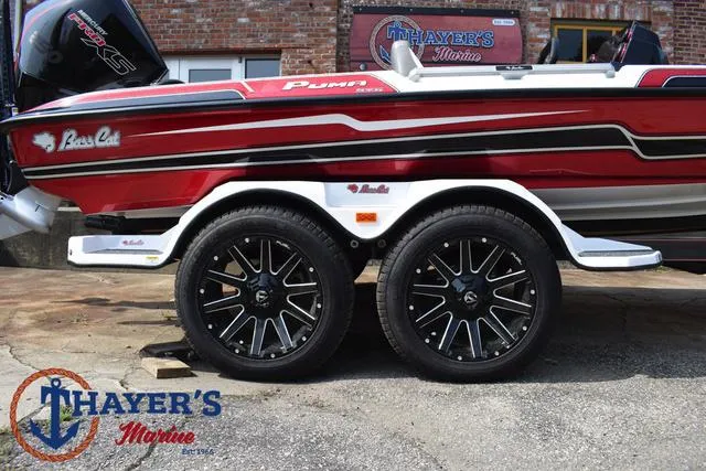 Slide: The Image of 2025 Bass Cat Puma STS boat on trailer at Thayer's Marine. - 7