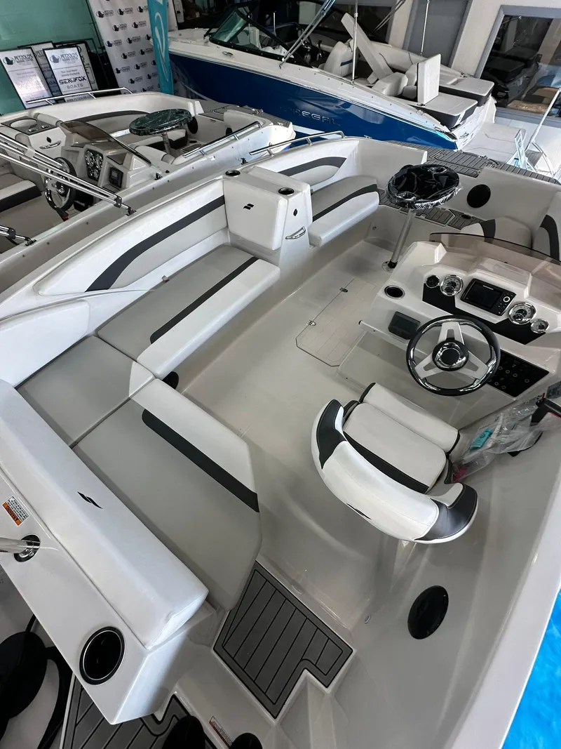 Slide: The Image of 2026 Starcraft SVX 171 OB boat interior with sleek seating and modern design. - 10