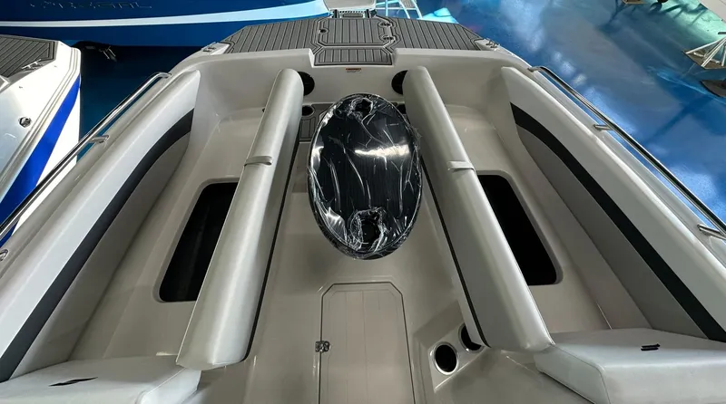 Slide: The Image of 2026 Starcraft SVX 171 OB boat dashboard with gauges, controls, and steering wheel. - 17