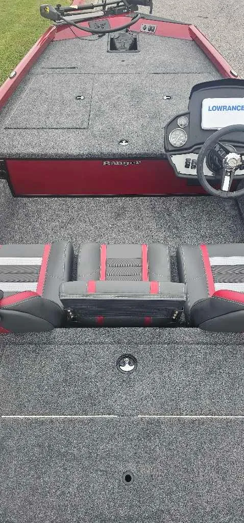 Slide: The Image of 2024 Ranger RT188 boat interior with steering console and seating. - 3