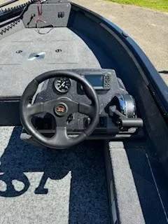 Slide: The Image of 2024 Ranger VS1665SC boat interior with steering wheel and dashboard controls. - 10