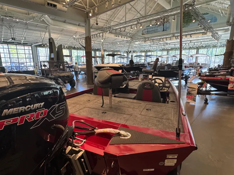 Slide: The Image of 2024 Ranger RT188P boat in showroom with Mercury Pro XS engine. - 3