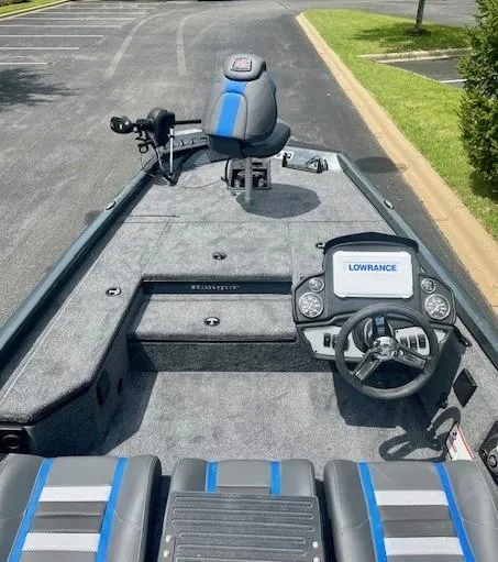 Slide: The Image of 2024 Ranger RT178 boat interior with steering console and seating. - 3