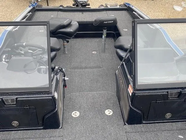 Slide: The Image of 2024 Nitro ZV20 Pro boat interior with seating and windshield. - 3